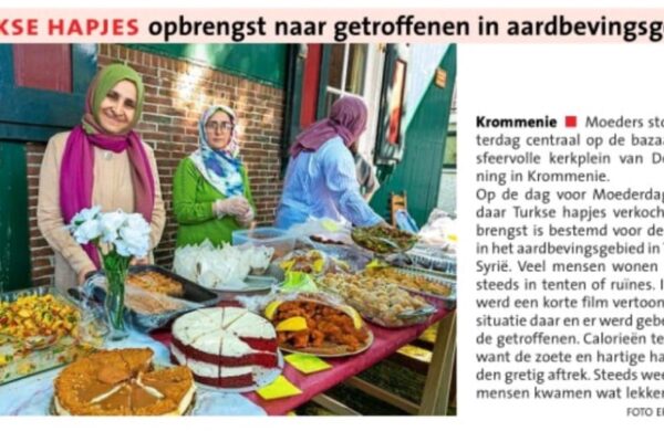 Geslaagde bazaar voor het aardbevingsgebied